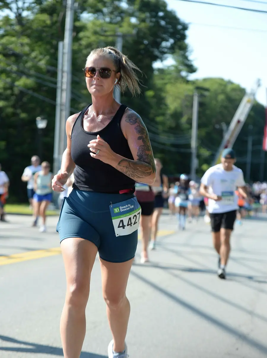 Sandy Martz running the TD Beach to Beacon 10K in Cape Elizabeth, Maine