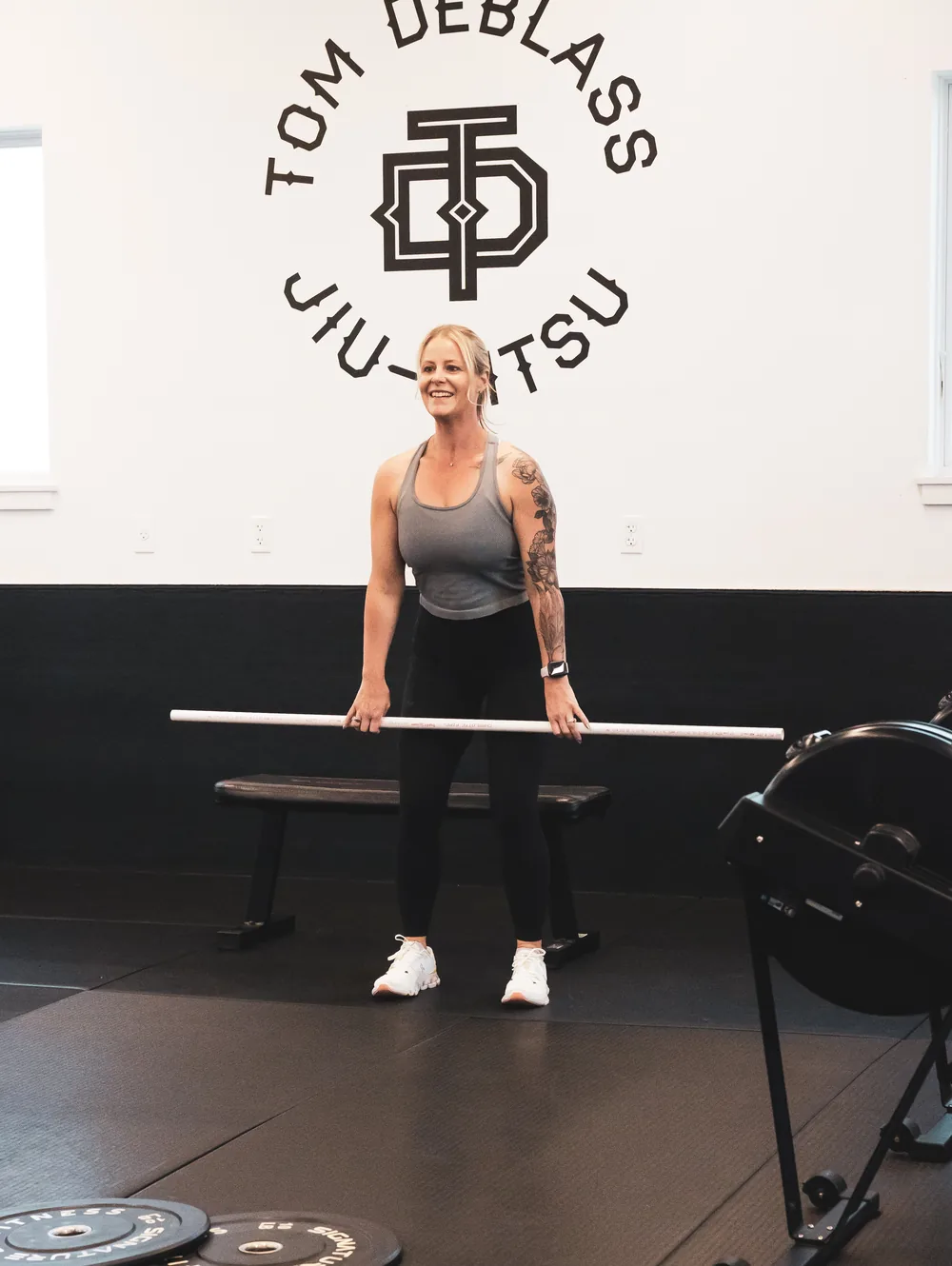 Coach Sandy Martz in the gym at Flow Strength