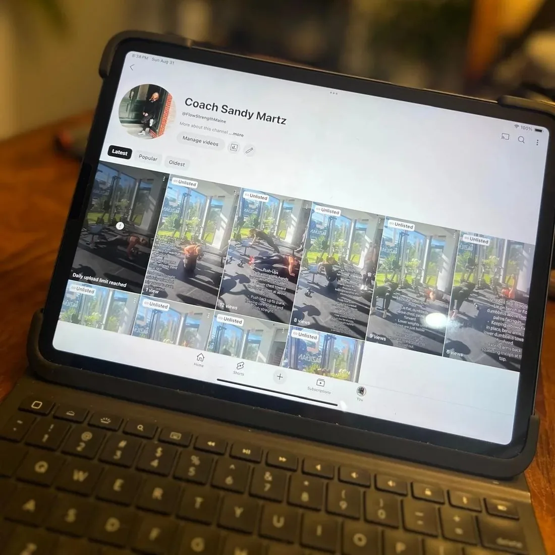 a tablet showing the Flow Strength member app